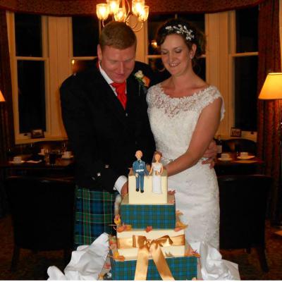 Edible tartan matches the groom's family tartan.