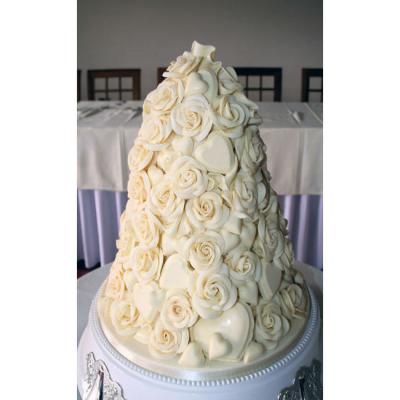 Wedding Cake Covered in Chocolate Hearts and Roses