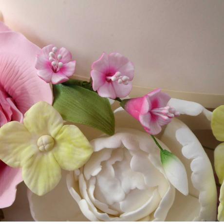Wired together with complimentary sugarcraft flowers
