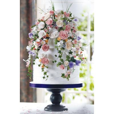 Wedding Cake Decorated with Sugar Thistles, Roses and Freesia.