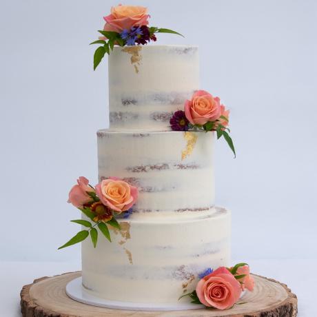 Semi-naked Three tier decorated with fresh roses