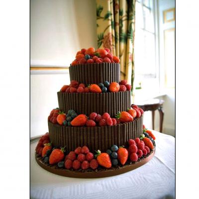 Dark Chocolate Cigarillo Cake with Fresh Summer Berries