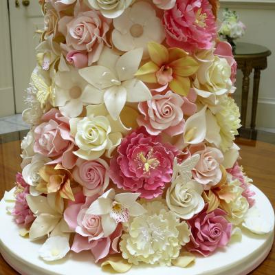 Handcrafted sugar orchids, lillies and roses.
