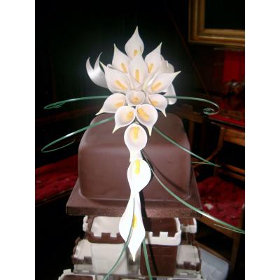 Top tier decorated with Handcrafted Calla Lilies
