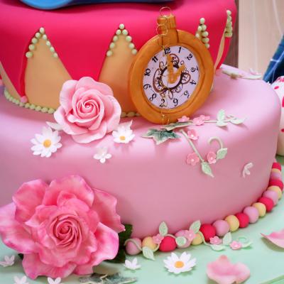 Each tier is decorated with handcraft sugar flowers.