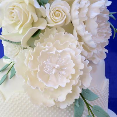 Soft Ivory Peony Roses are also available too rder.