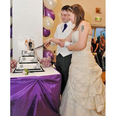 Vikki and Colin Cutting the Cake